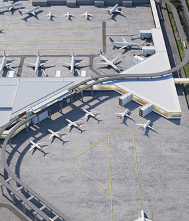 Aerial view of an airport terminal with aircraft at the gates